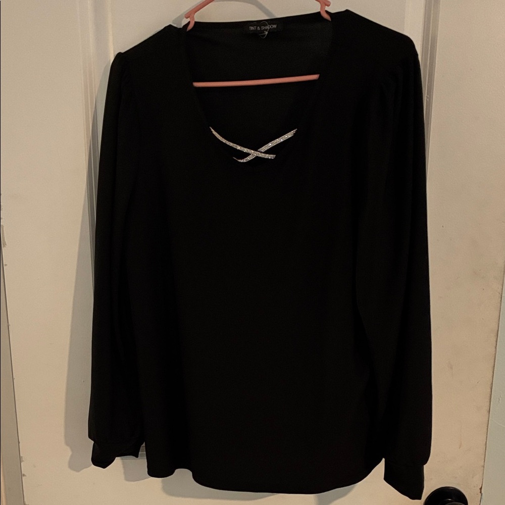 Elegant Black Blouse with Stylish Neckline